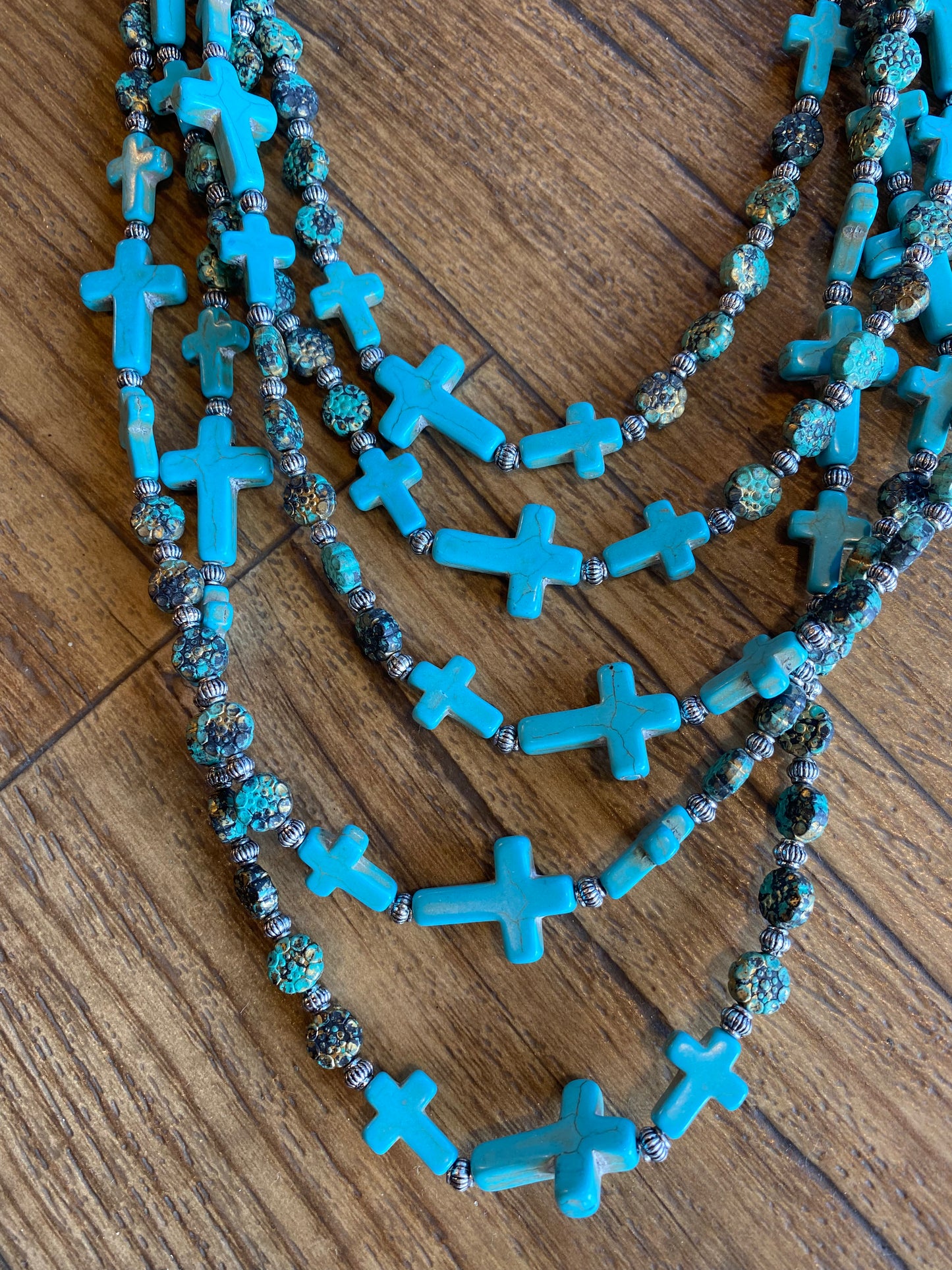 Layered faux turquoise cross necklace