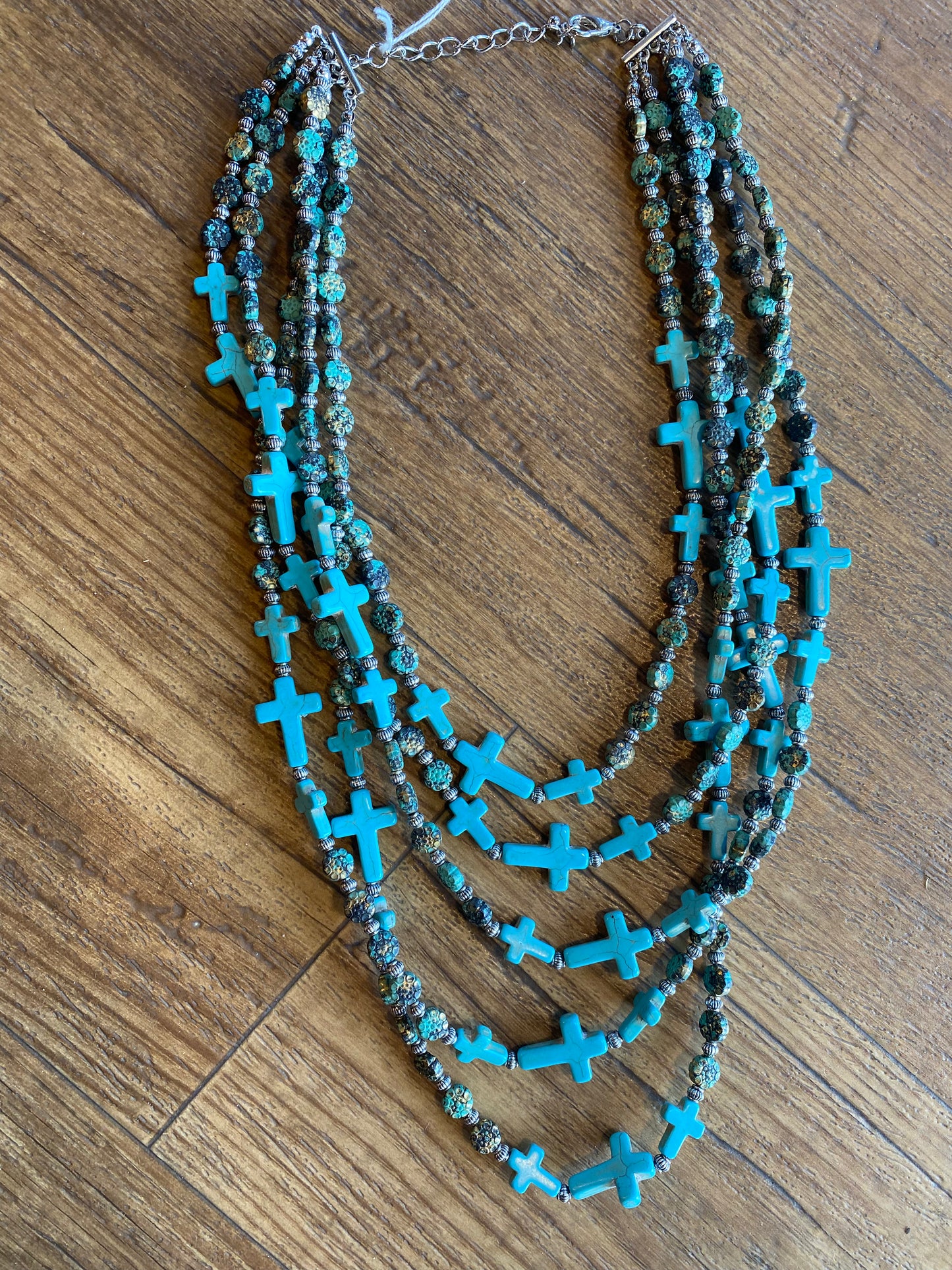 Layered faux turquoise cross necklace