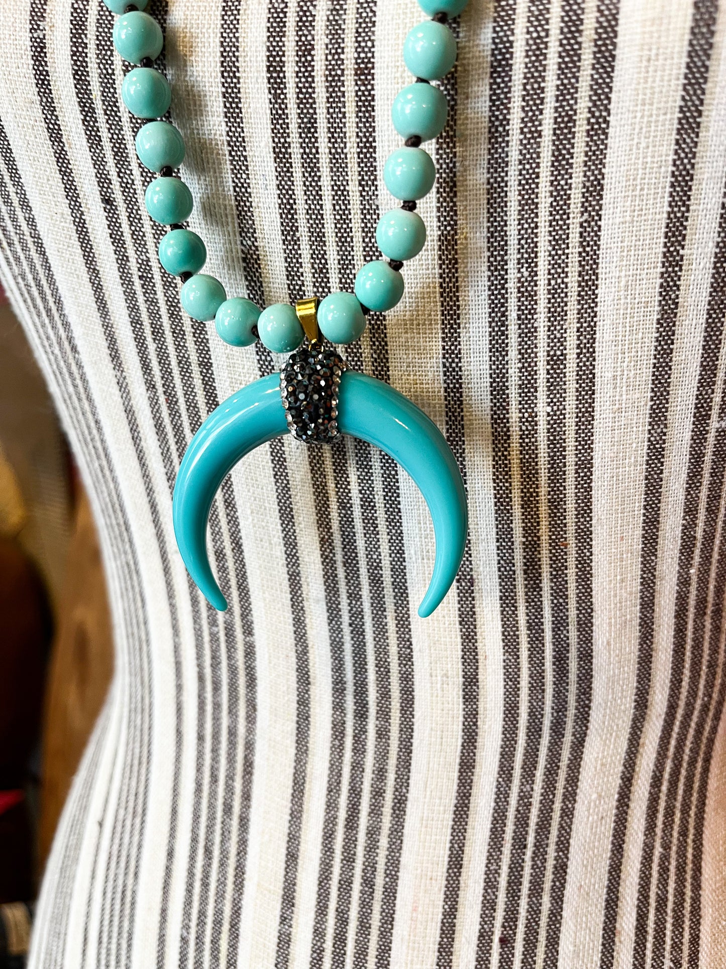 Enchanted Echo Turquoise Blue Color Beaded Strand Horn Necklace
