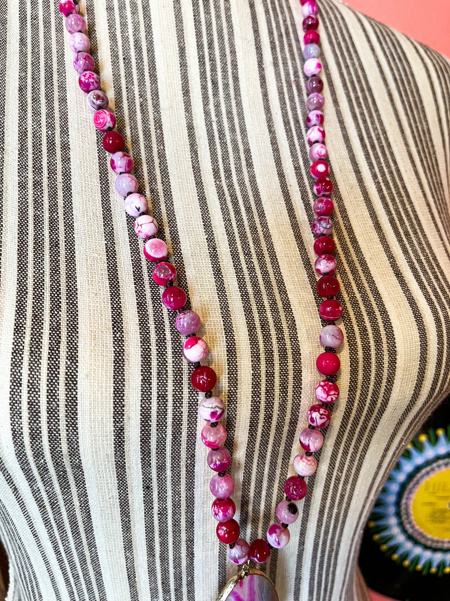 Wanderlust Treasure Pink Beaded Knot Pendant Necklace