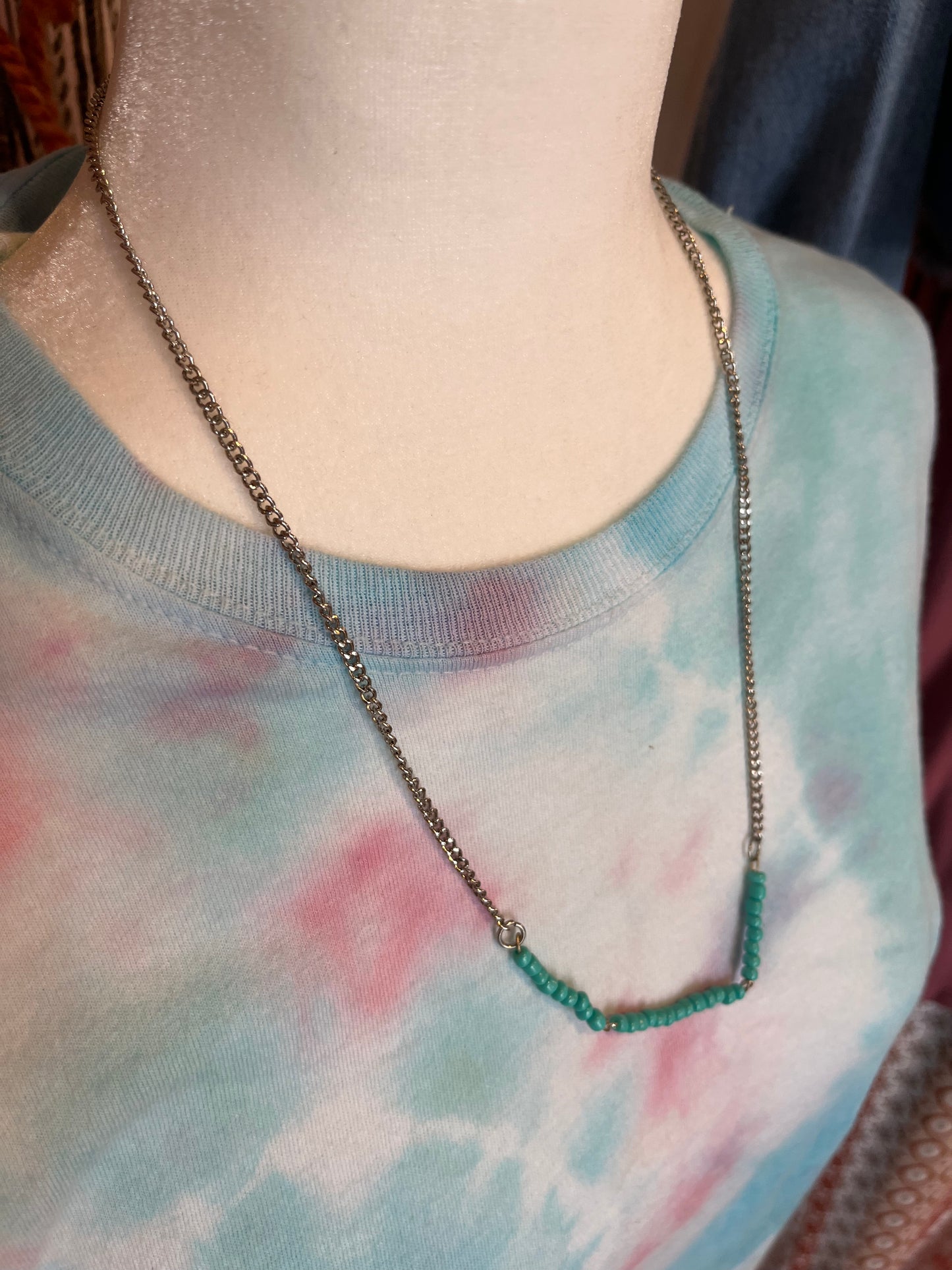 Simple turquoise colored beaded bar necklace