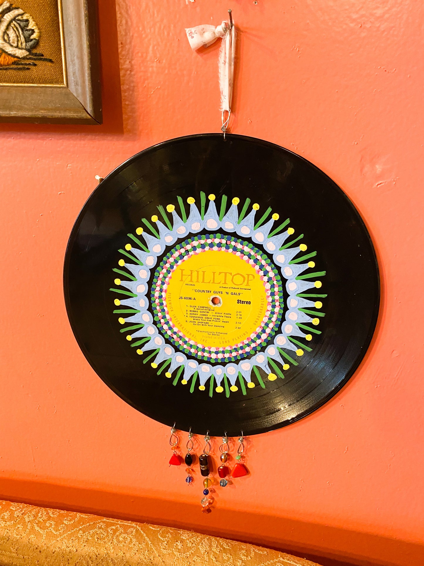 Painted record wall hanging