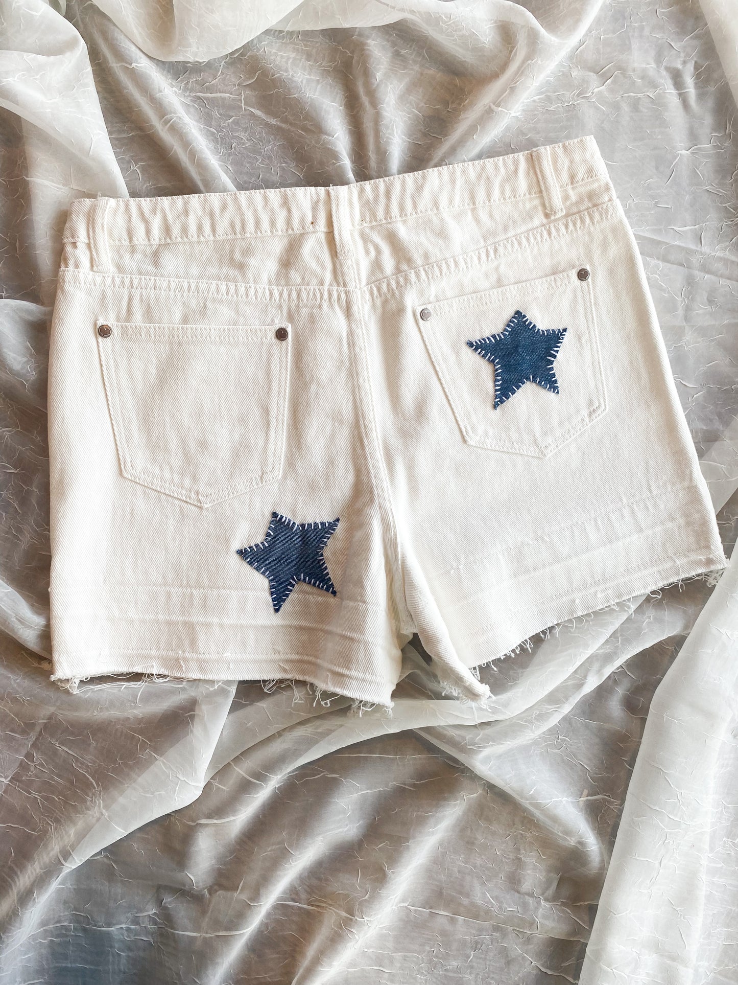 Star patchwork white cut off shorts