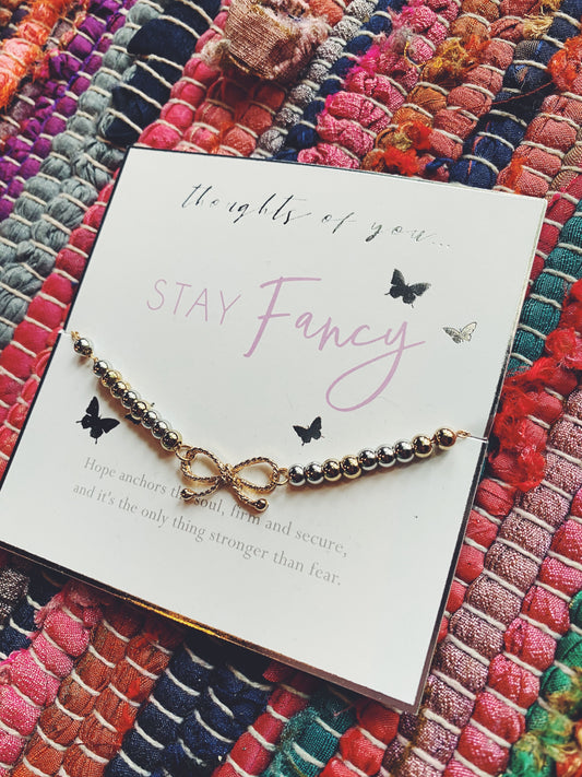 Thoughts of You "Stay Fancy" Bow Charm Chain Bracelet