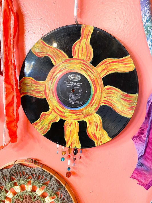 Painted sun record wall hanging
