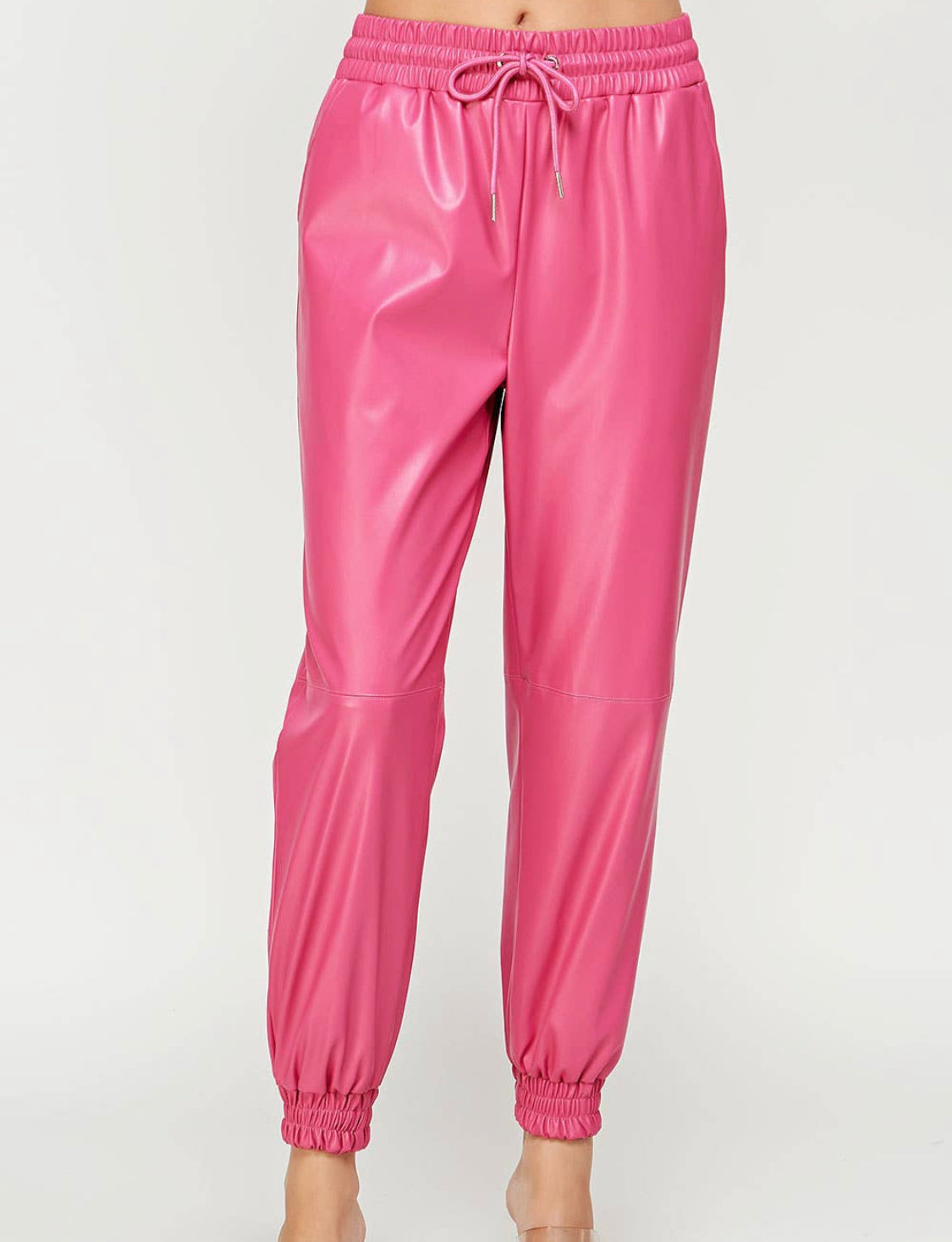 Hot pink faux leather joggers