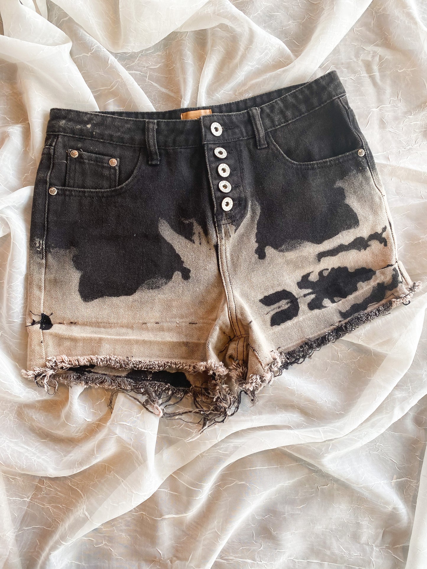 Bleached dipped cut off shorts