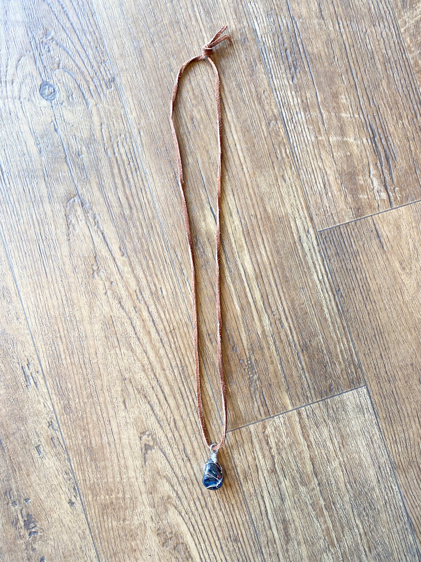 Hematite wire wrapped leather cord necklace