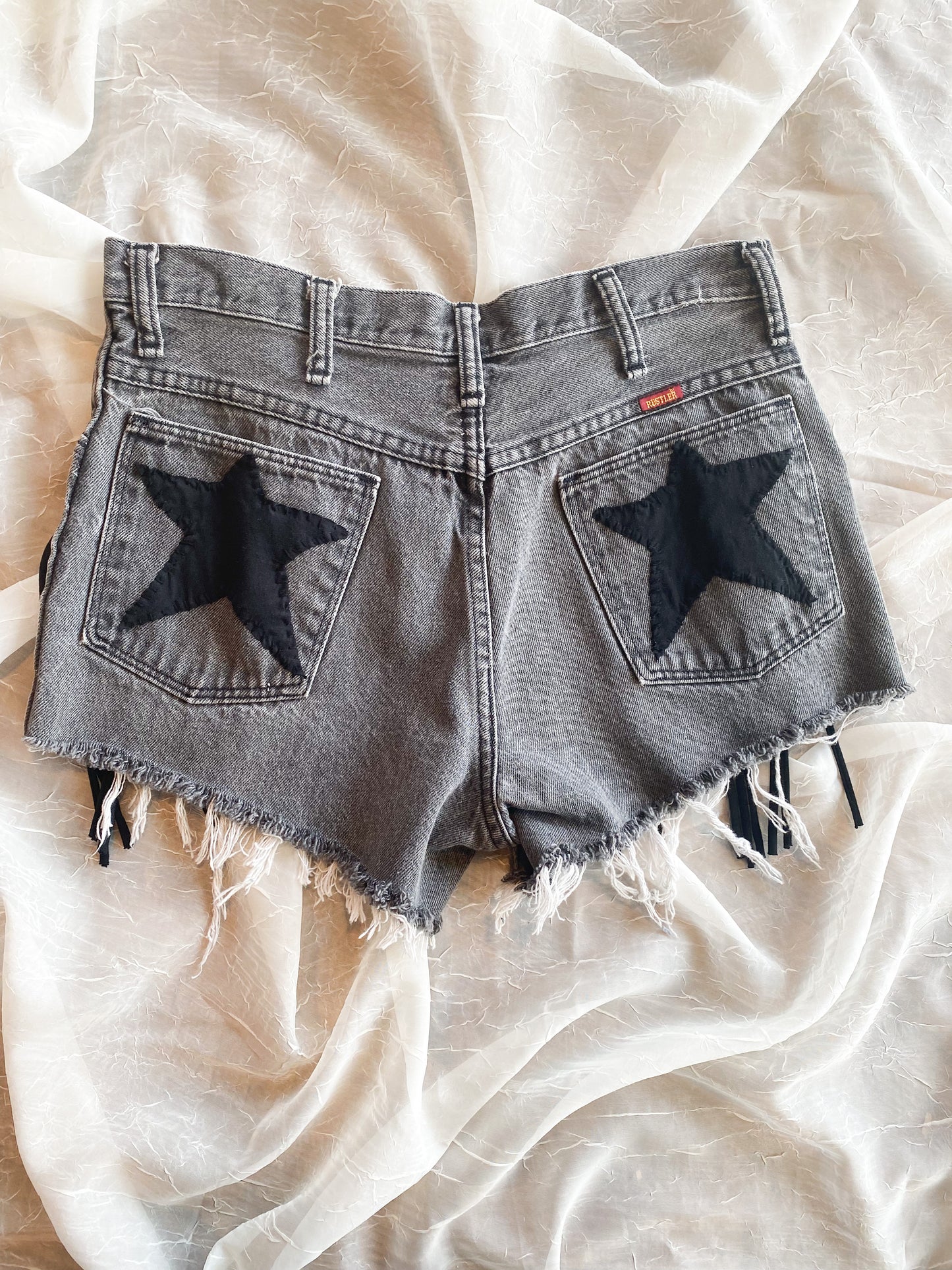 Upcycled star fringe shorts size 33 (2-6)